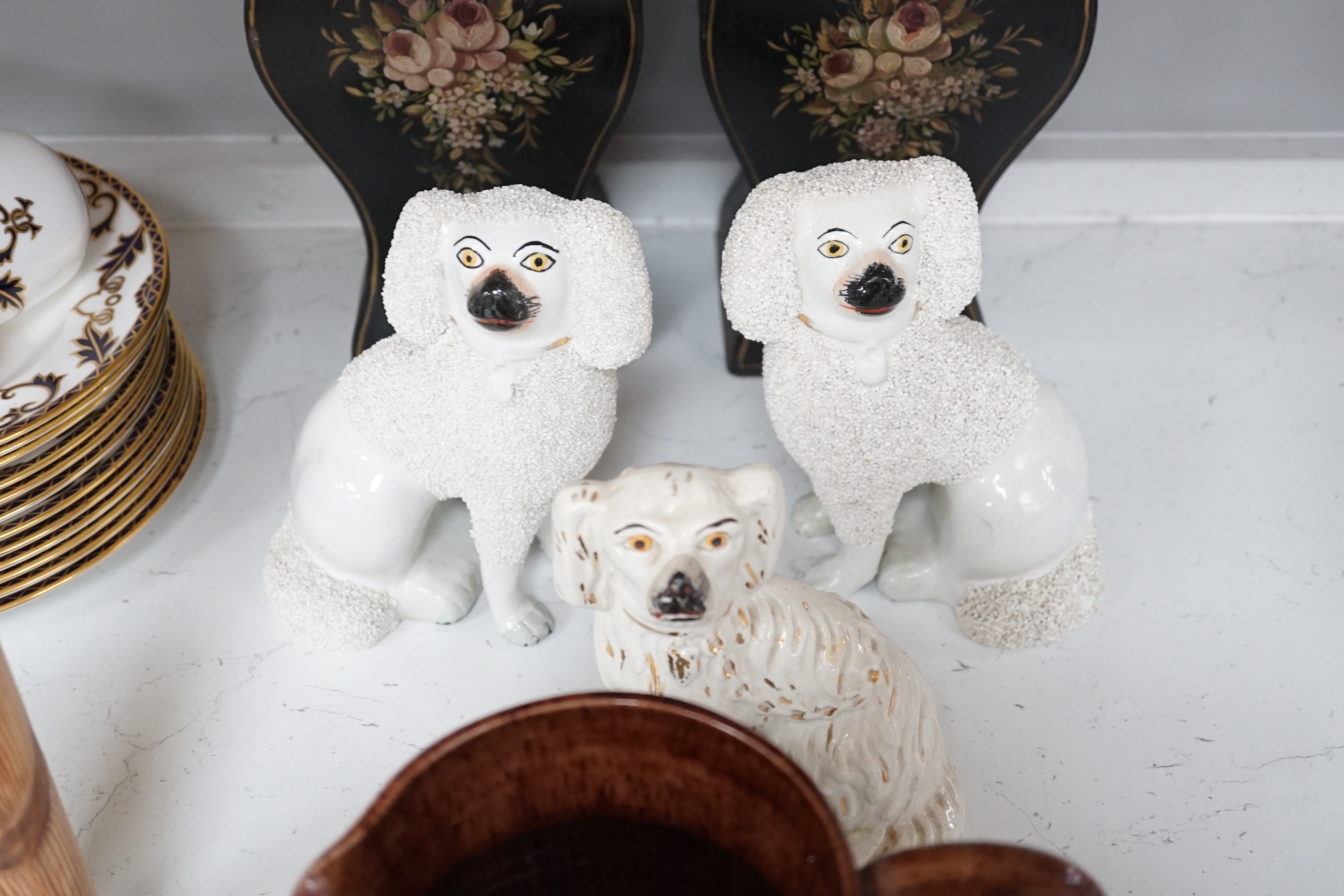 Seven items including a pair of toleware vases and covers, a Rye pottery jug, three Staffordshire dogs and a green leaf pedestal dish, Rye jug 16cm high